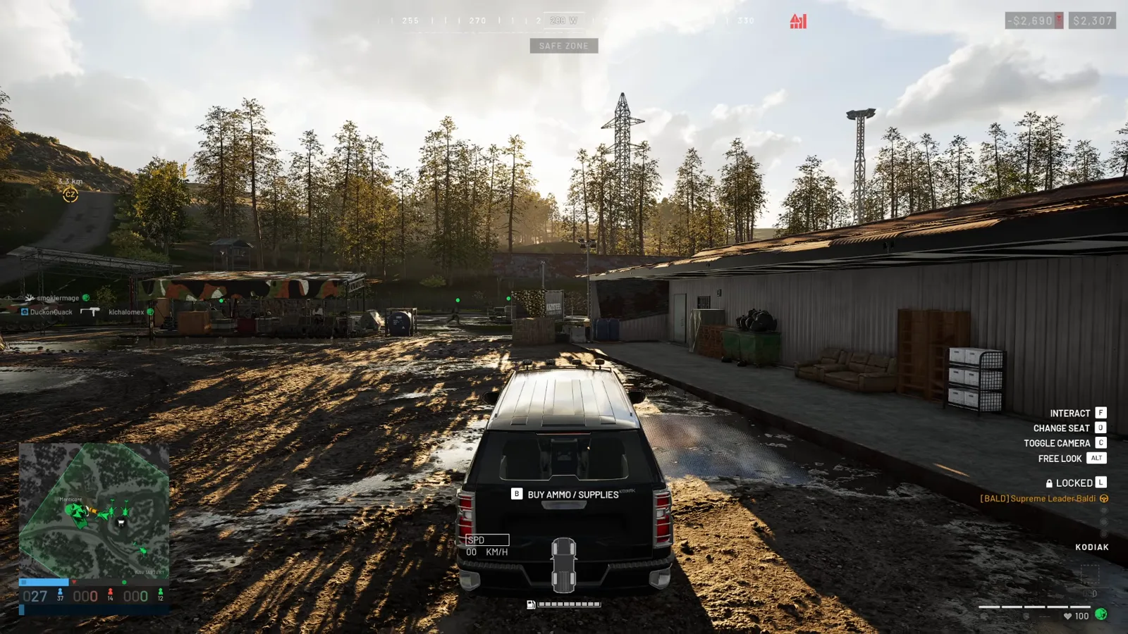 WARDOGS Kodiak SUV parked in a safe zone with the B Buy Ammo slash Supplies prompt on the rear door and the vehicle keybind list down the right side of the HUD