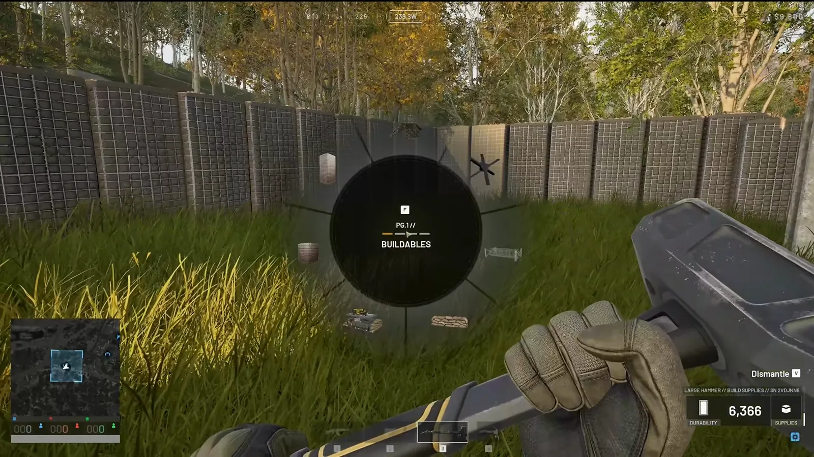 WARDOGS radial build menu open on the Bag Walls and Hesco Barricade options while fortifying a mortar pit behind stacked sandbags