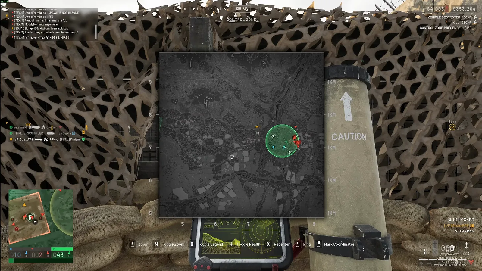 WARDOGS player setting a Stingray launch tube onto the ground at a FOB with a CAUTION warning over the tube, the tactical map open and an UNLOCKED banner across the top