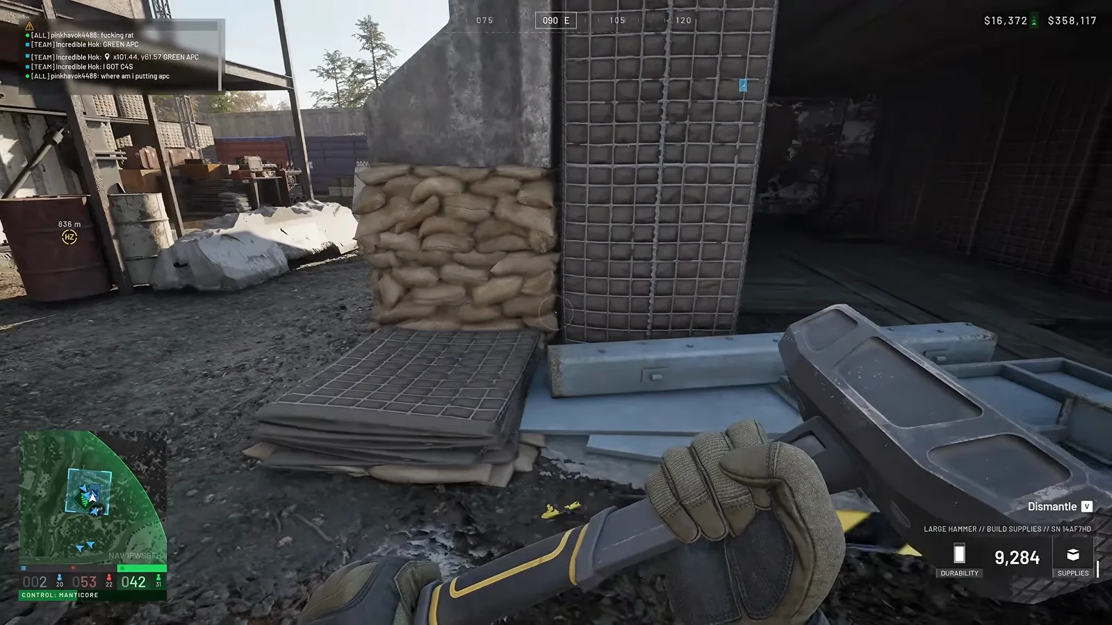 Overhead WARDOGS APC garage roof parapet with tall Bremmer walls shielding the mobile respawn exit point from enemy sniper lines across an industrial map sector